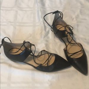 Pointed toe lace up flat